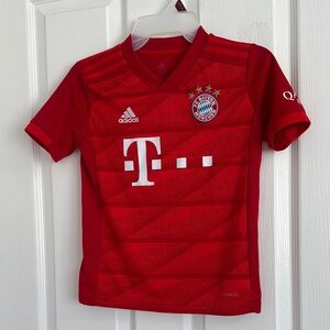 Adidas Red Soccer Jersey with Iconic Three Stripes